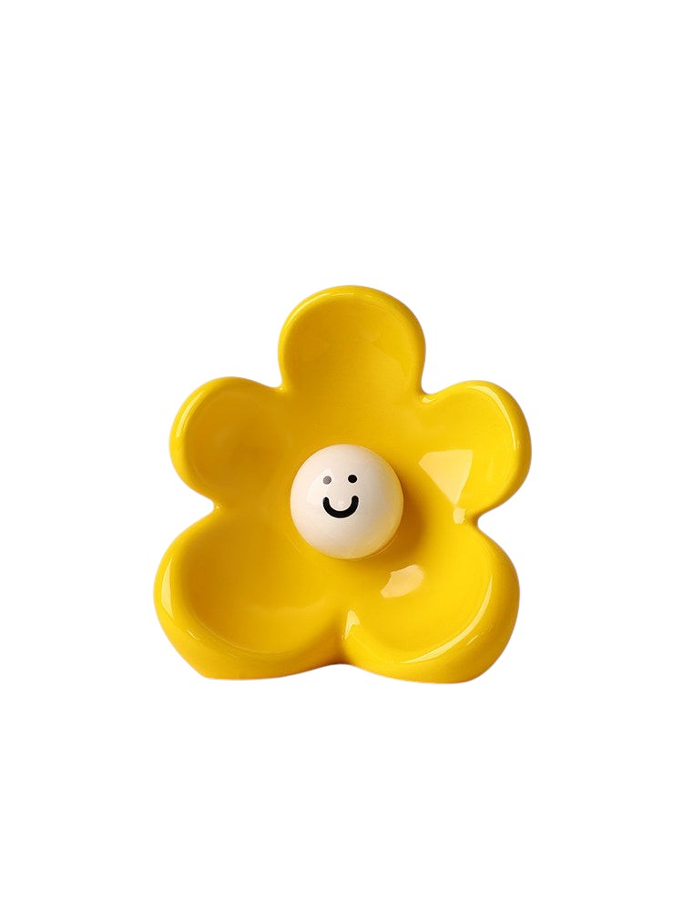 HOMELIVY yellow ceramic flower-shaped vase with a cute white smiley face center for home decor.