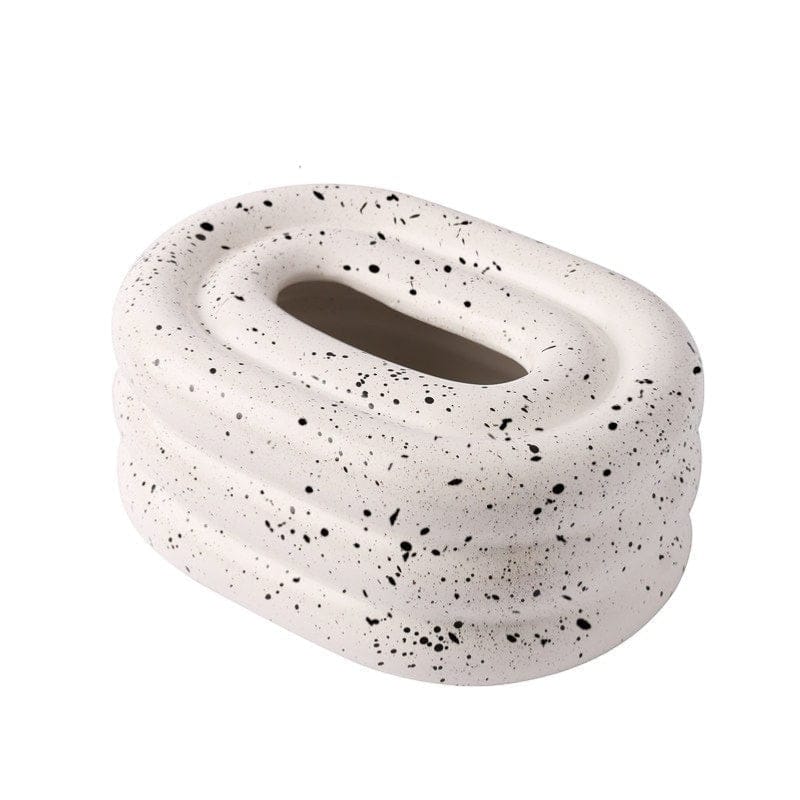 HOMELIVY speckled terrazzo tissue box holder with a retro bubble form and sculptural design.