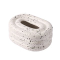 HOMELIVY speckled terrazzo tissue box holder with a retro bubble form and sculptural design.