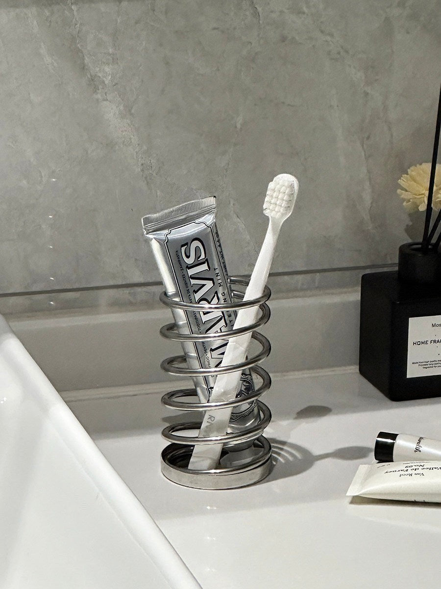 Silver stainless steel toothbrush holder and toothpaste squeezer