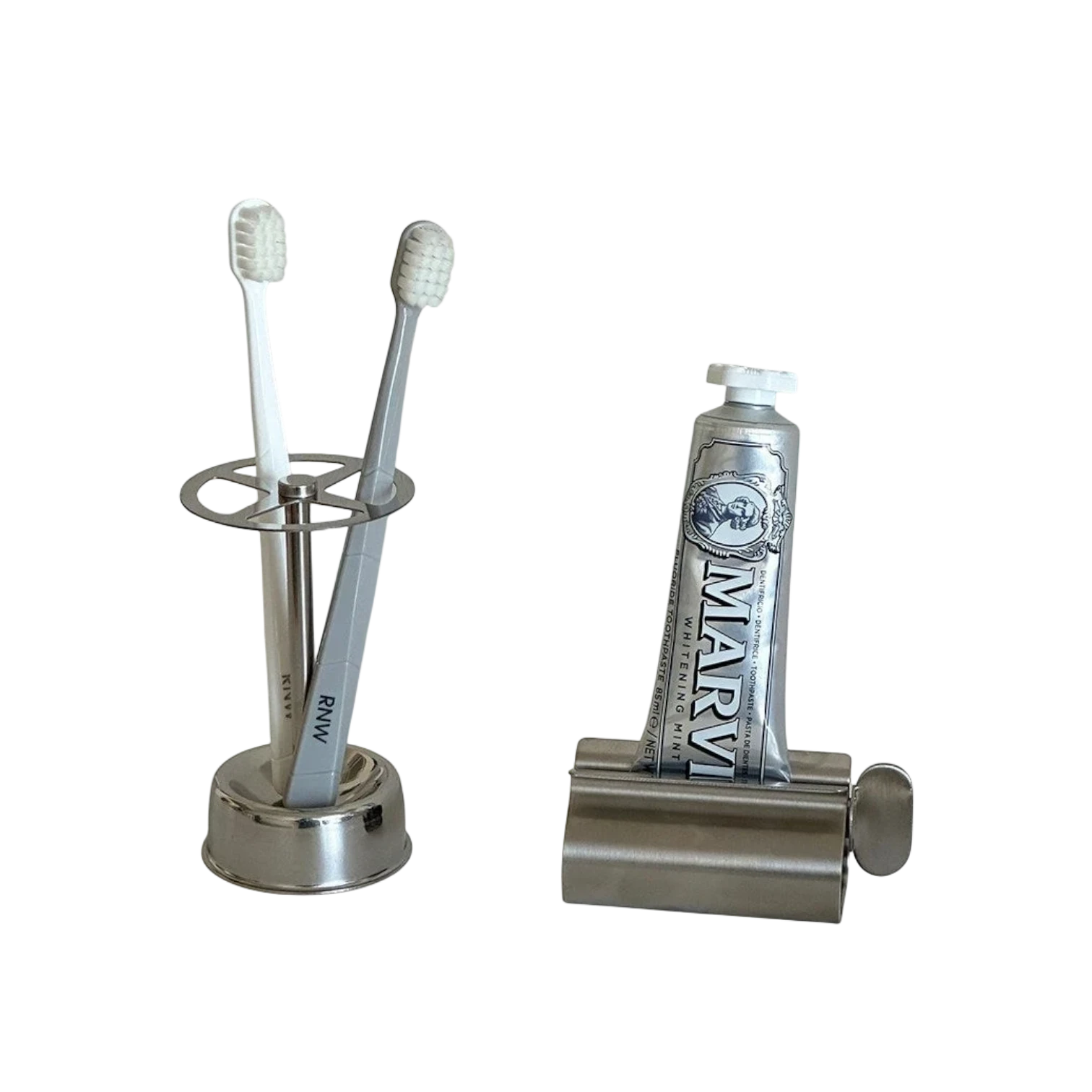 Silver stainless steel toothbrush holder and toothpaste squeezer