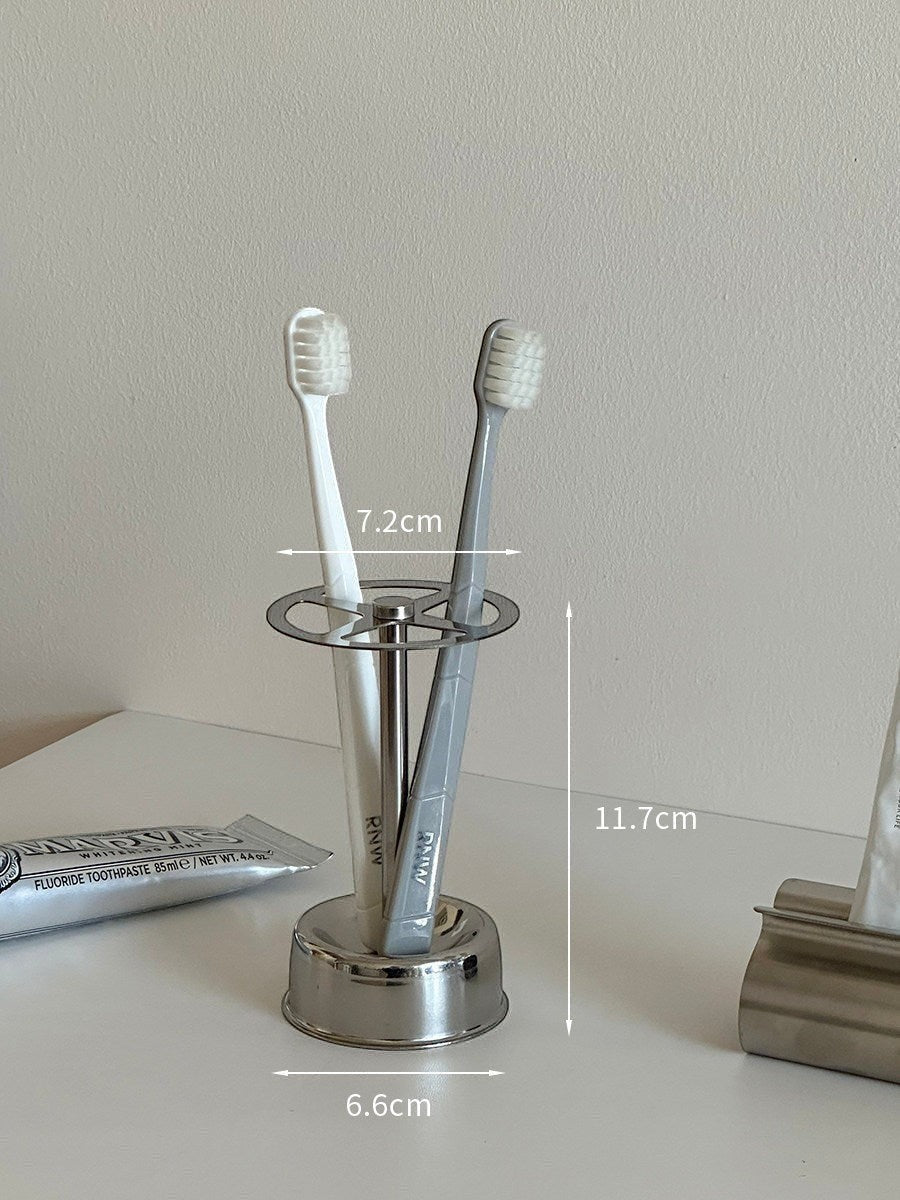 Silver stainless steel toothbrush holder and toothpaste squeezer