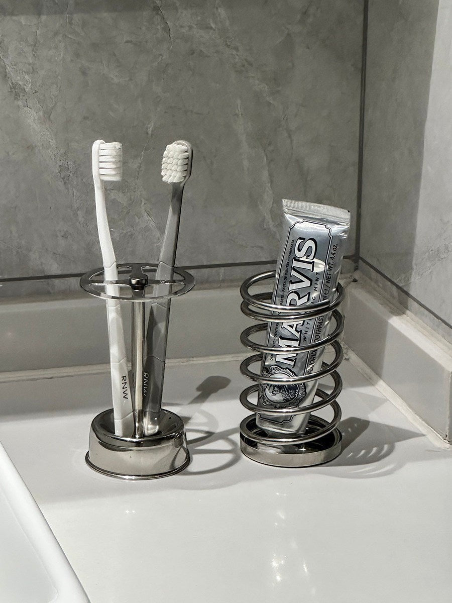 Silver stainless steel toothbrush holder and toothpaste squeezer