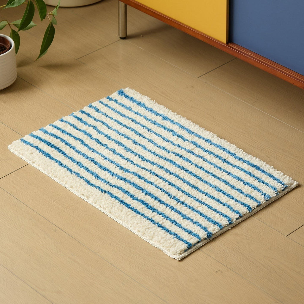 HOMELIVY minimalist striped bath mat rug in white with blue stripes, soft absorbent material