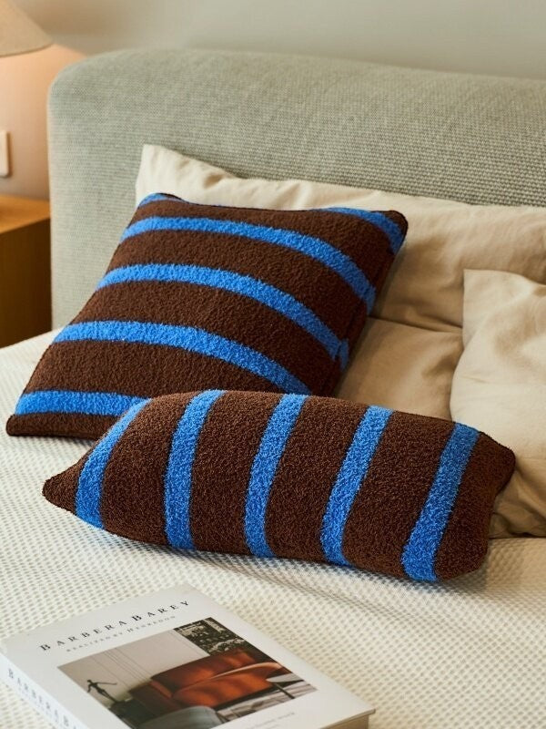 HOMELIVY brown and blue striped velvet waist pillows on a bed with minimalist Nordic decor