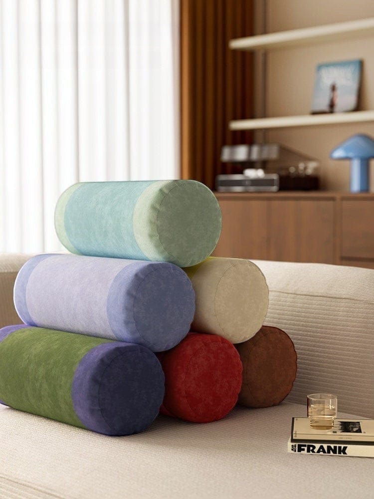 HOMELIVY velvet bolster pillow in muted sage green, dusty blue, lilac, terracotta, and cream. Soft plush cylinder cushion.