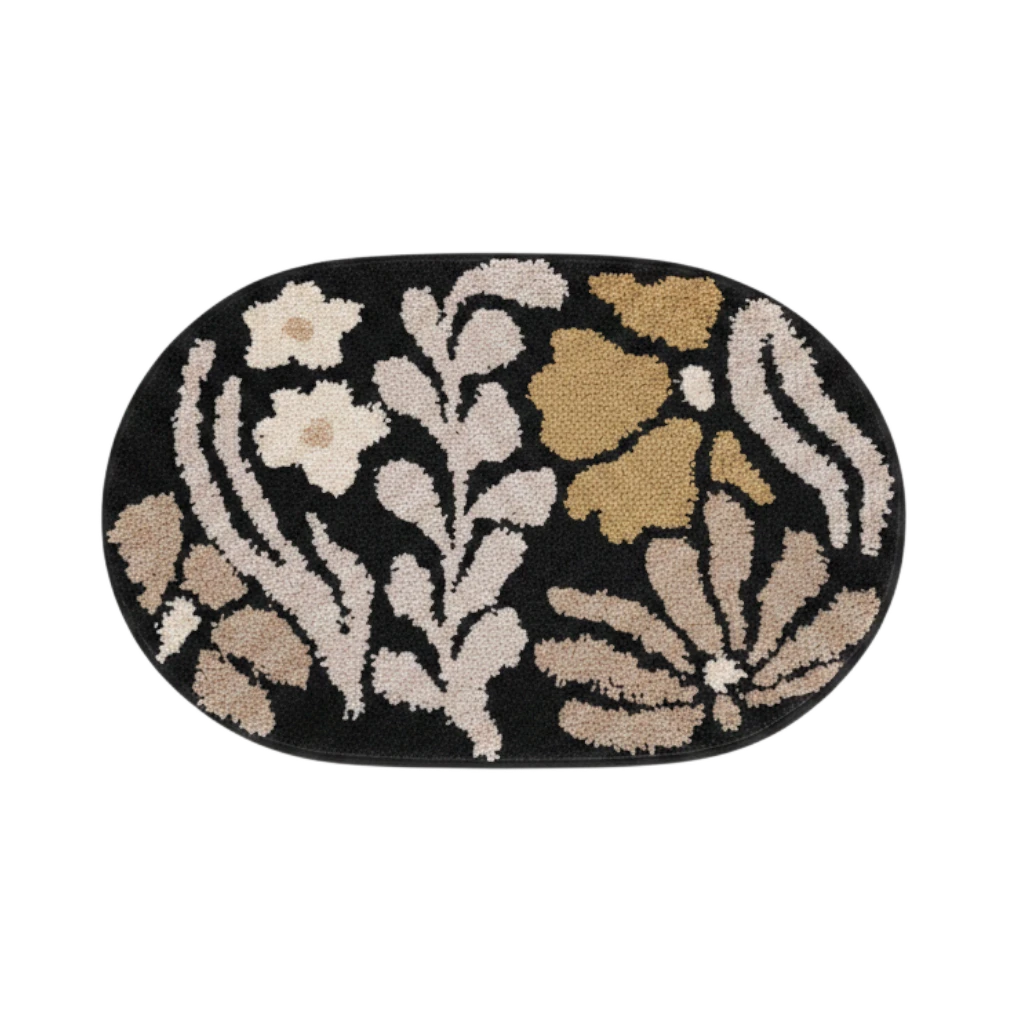 HOMELIVY Vintage Style Floral Bath Mat in black with beige, tan, and cream floral pattern. Oval shape.