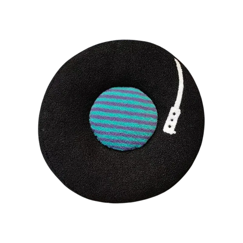HOMELIVY black vinyl record throw pillow with turquoise and purple striped center label and white detail.