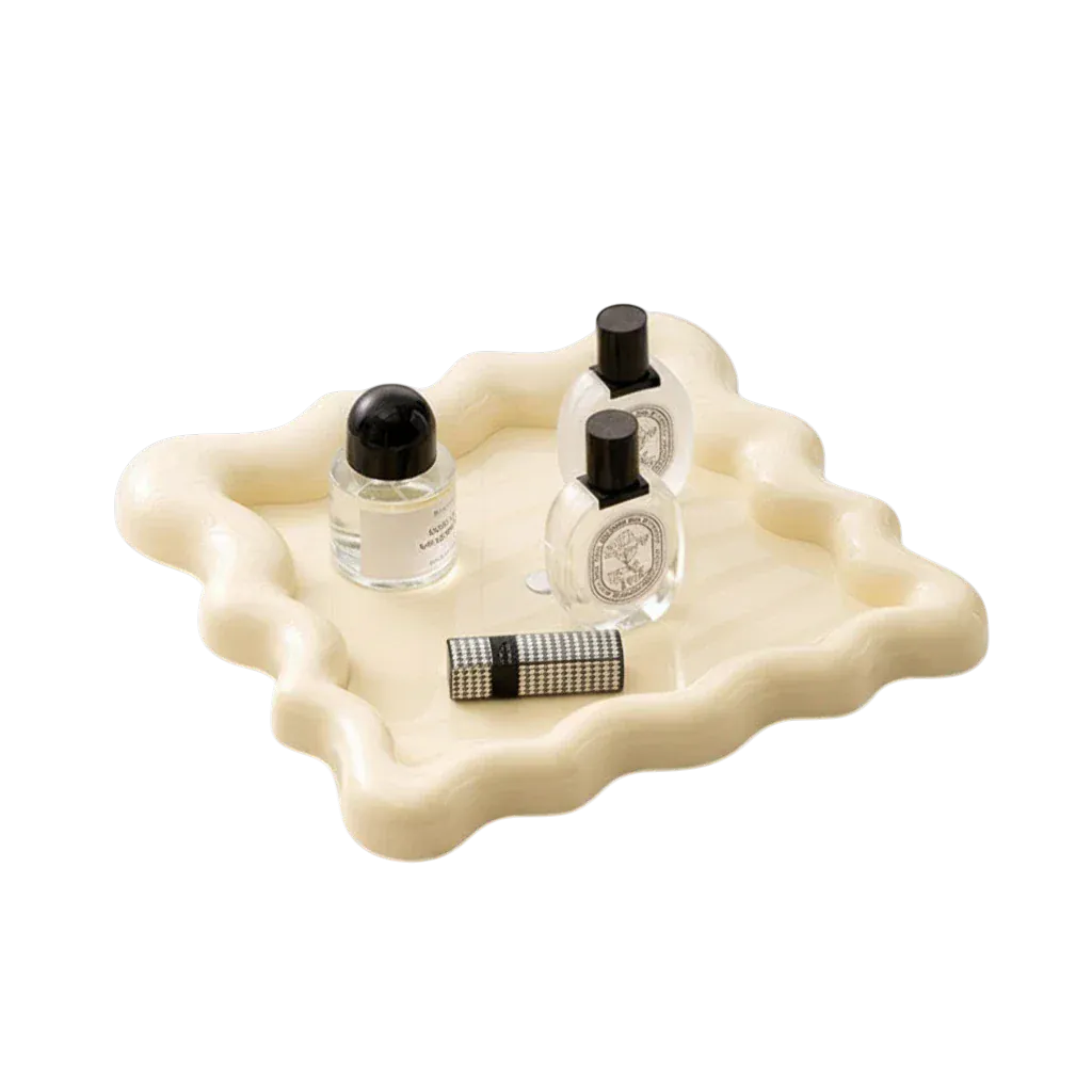 HOMELIVY wavy ceramic tray in cream, perfect for organizing perfumes, makeup, or as a decorative centerpiece.