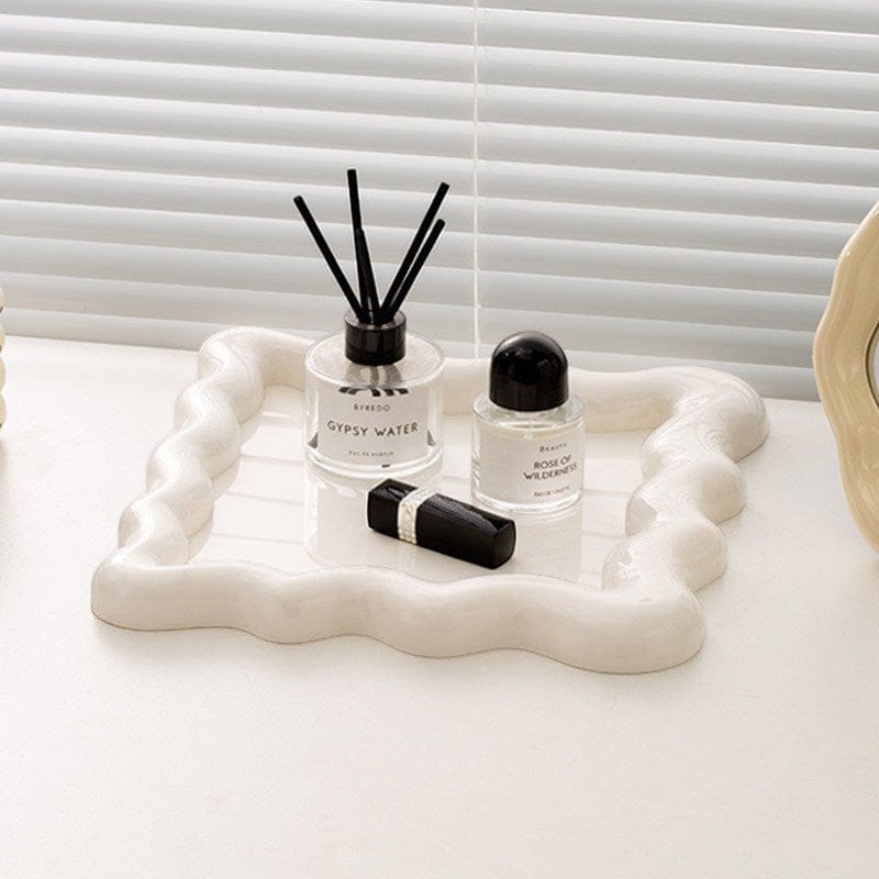 HOMELIVY wavy ceramic tray in cream, perfect for organizing jewelry, keys, or displaying decor.