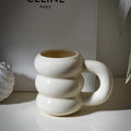 HOMELIVY white ceramic bubble coffee mug with sculptural stacked rings and oversized handle. 350ml capacity.