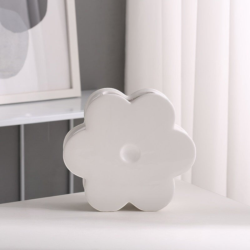 HOMELIVY white ceramic flower shaped vase with a minimalist design on a white table