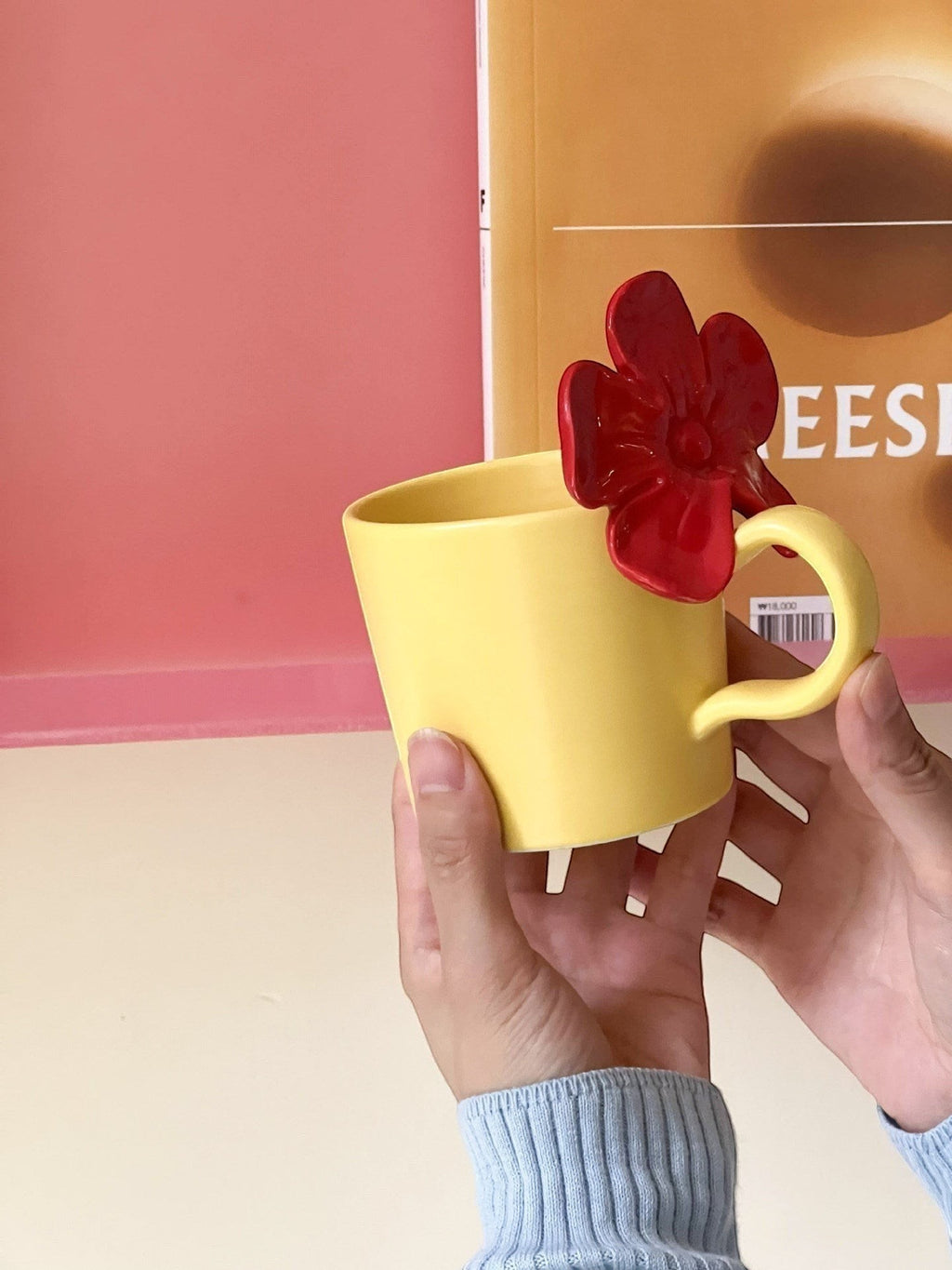 Yellow mug with 3D red flower handle