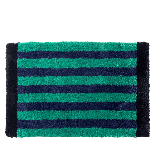 Green retro striped bath mat with teal and navy blue plush textured surface for bathroom use