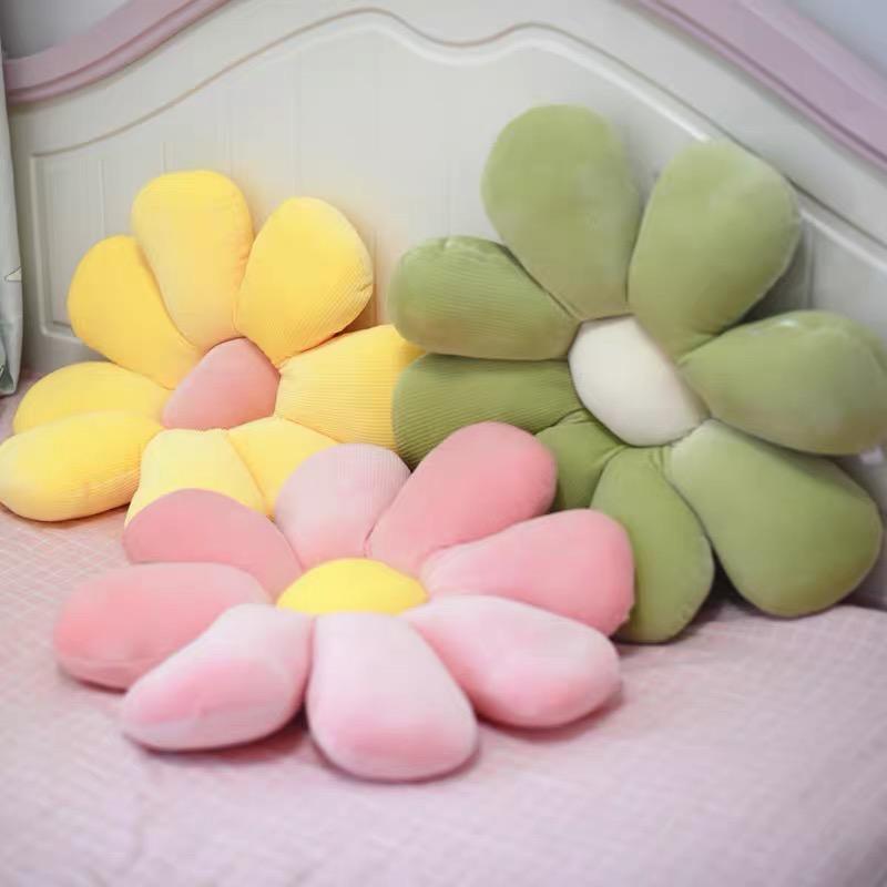 Pastel flower cushion set of three plush flower-shaped cushions in yellow pink and green with velvety petals and white center