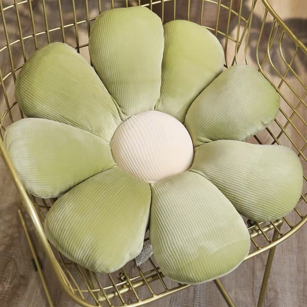 Pastel flower cushion a soft light green corduroy flower shaped cushion with cream colored center for decor