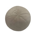 Beige suede round pouf with stitched radial seams shaped plush cushion for comfortable seating or decor