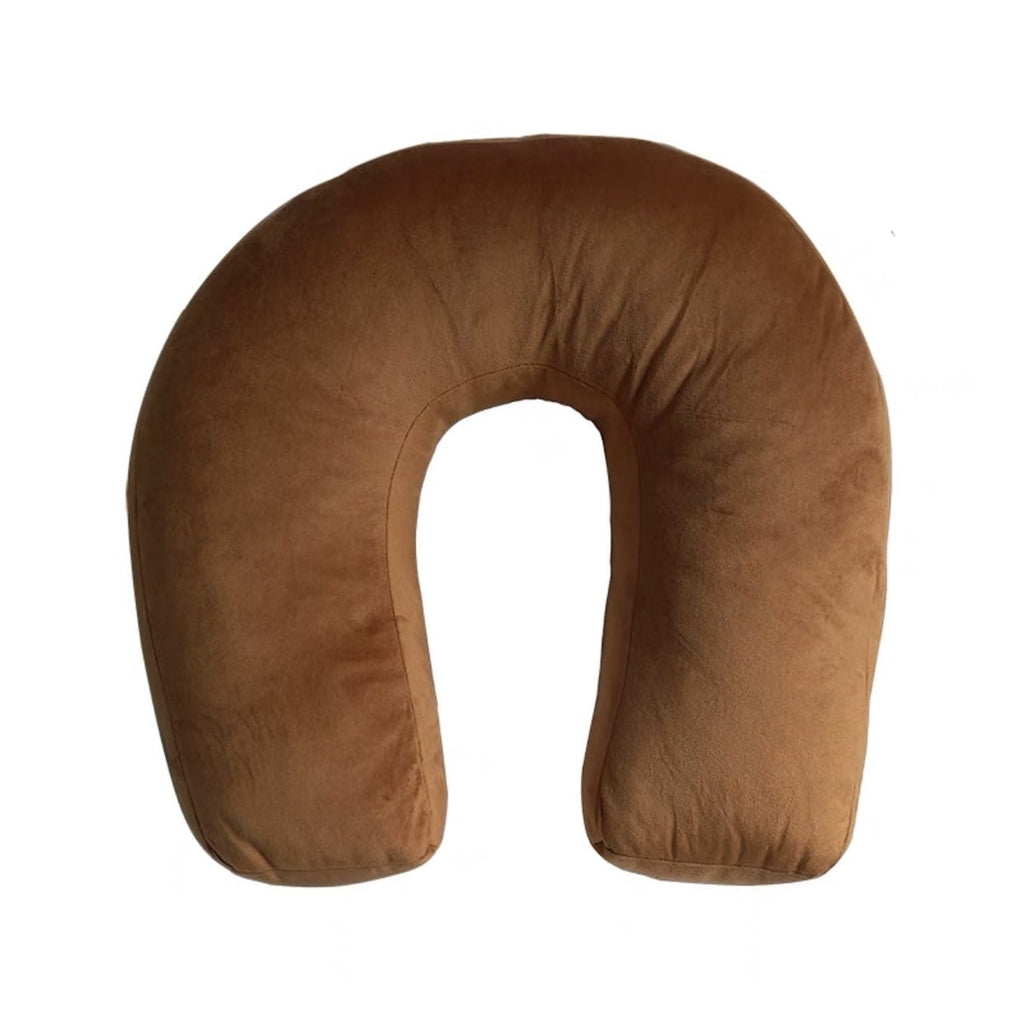 Brown suede-like travel neck pillow with soft plush texture and u-shaped design in shaped plush cushion product