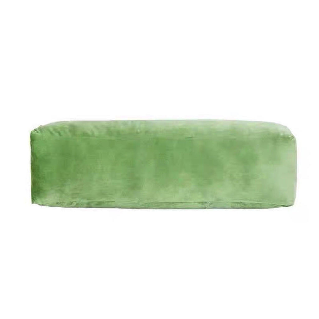 A soft rectangular green velvet plush velvet geometry pillow with a plush texture and rounded edges