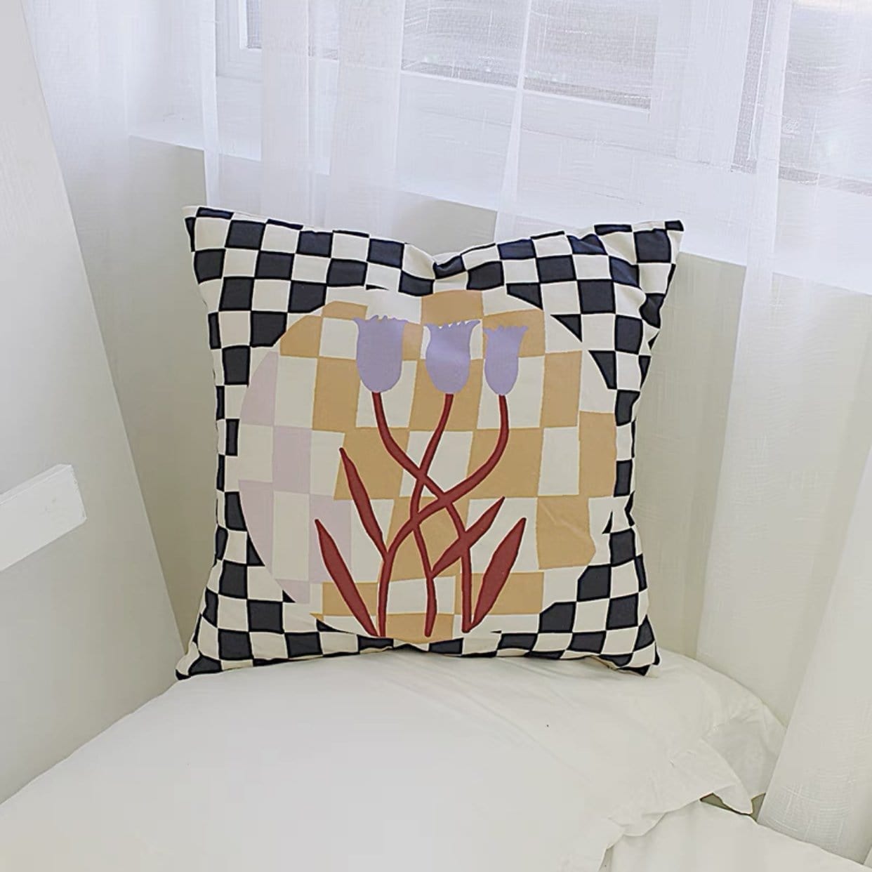 black and white checkered throw pillow