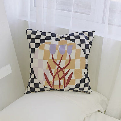 black and white checkered throw pillow