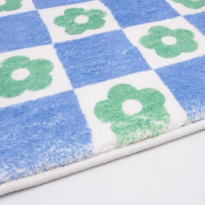 Blue Checkered Rug with Daisy Flowers
