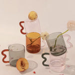 Load image into Gallery viewer, Wavy Handle Glass Mug
