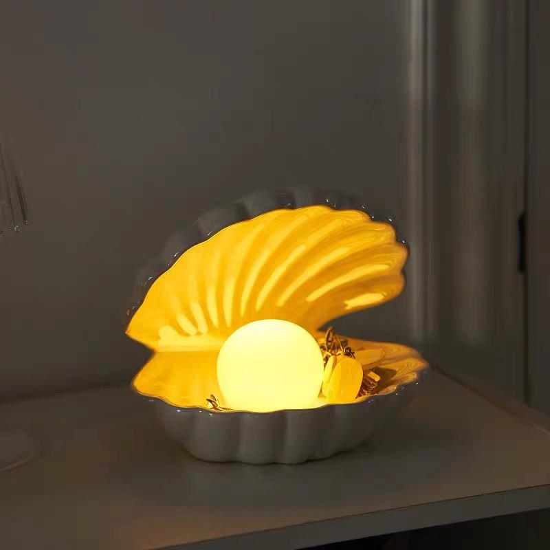 white seashell lamp and jewellery tray