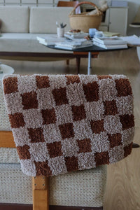 Brown checkered rug bath mat