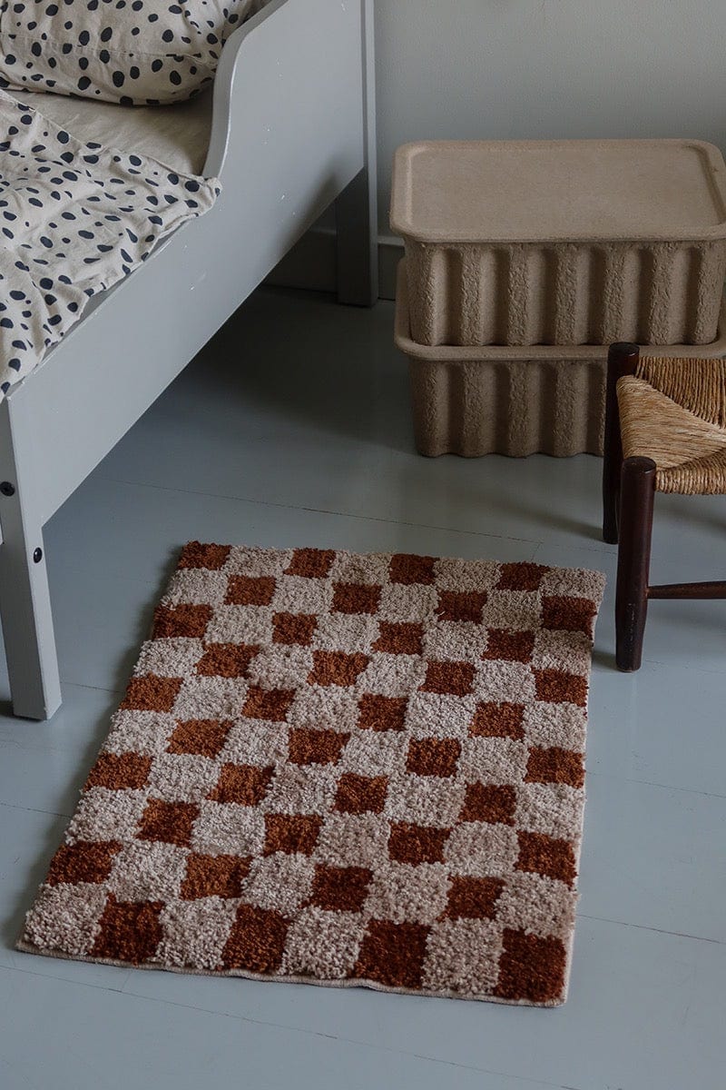 Brown checkered bath mat rug