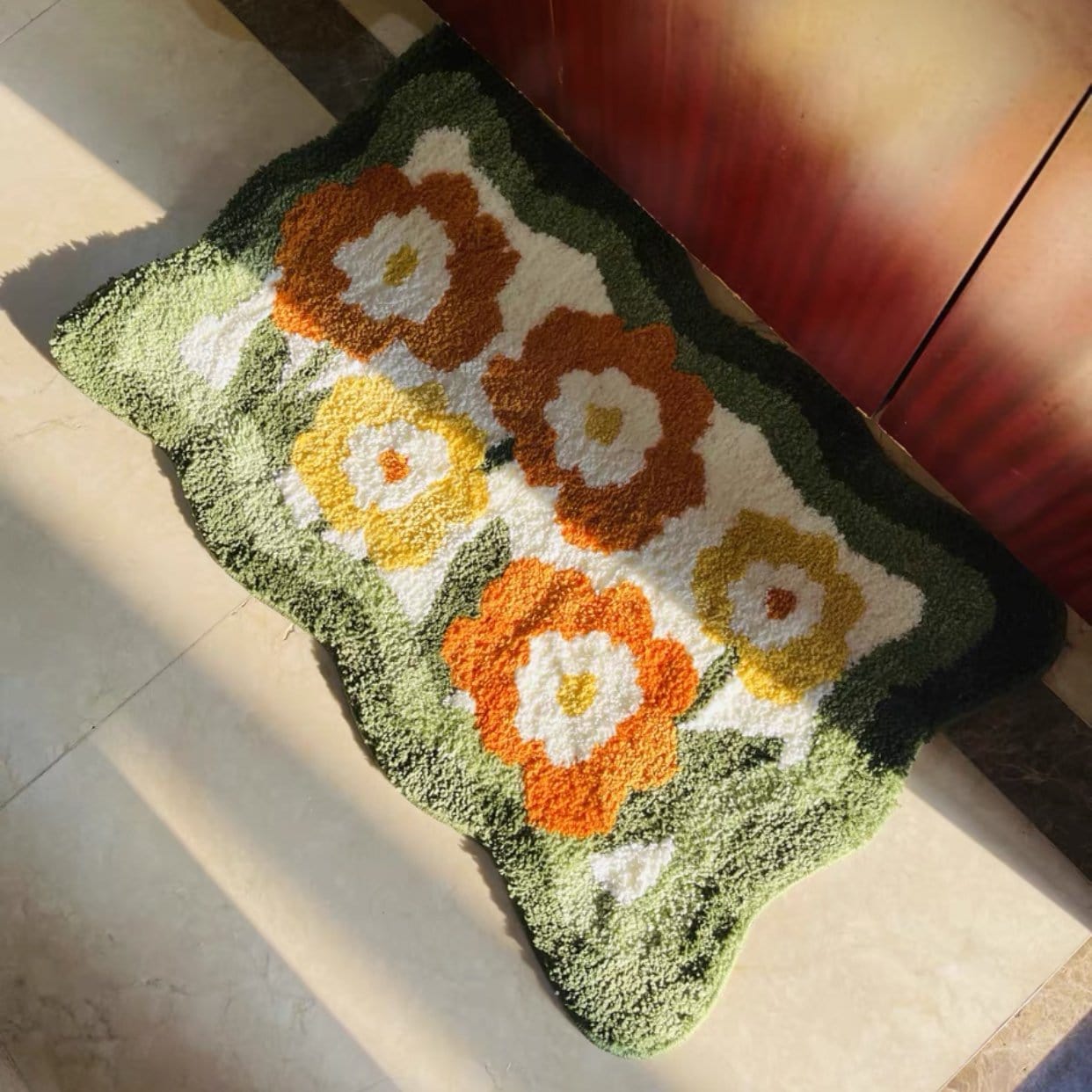 green and orange floral bathmat rug