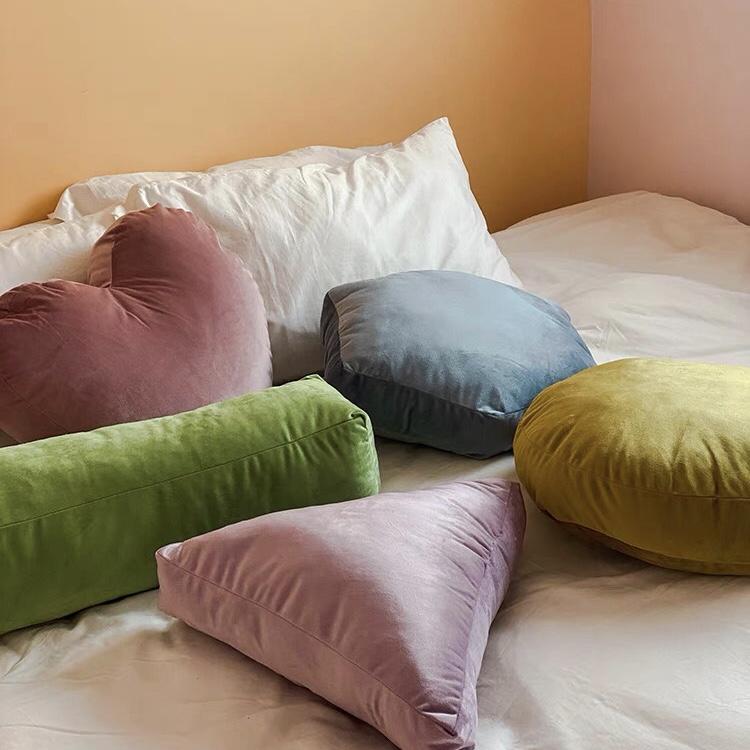 Plush velvet geometry pillow collection in dusty rose sage green lavender and mustard yellow soft pastel shades