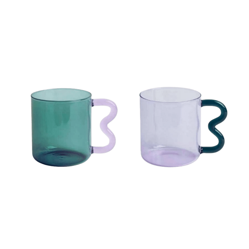 https://homelivy.com/cdn/shop/products/wavy-handle-glass-mug.png?v=1647053365