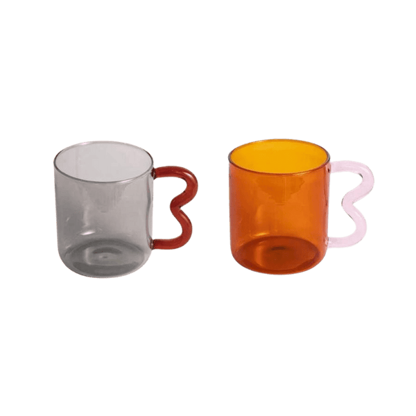 https://homelivy.com/cdn/shop/products/wavy-handle-glass-mug_2_grande.png?v=1647053385